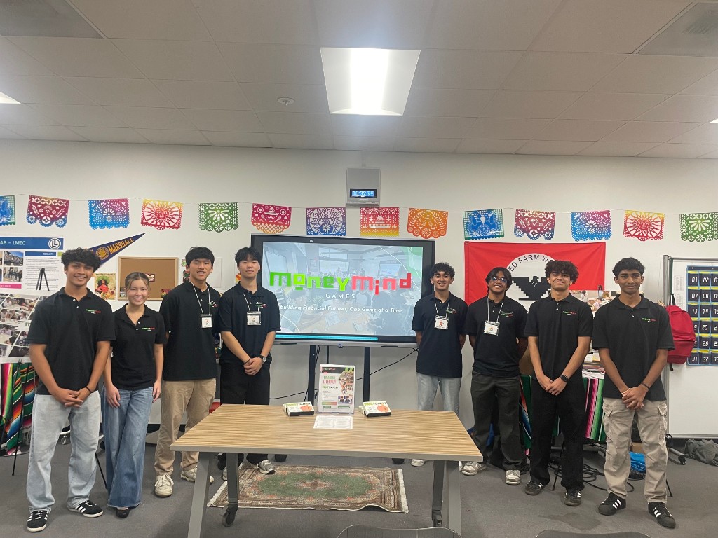 The MoneyMind Games team presenting at an educator workshop